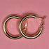Tykke creoler i guldfarvet metal, 3 cm i diameter